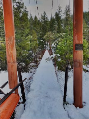 suspension bridge in the snow
